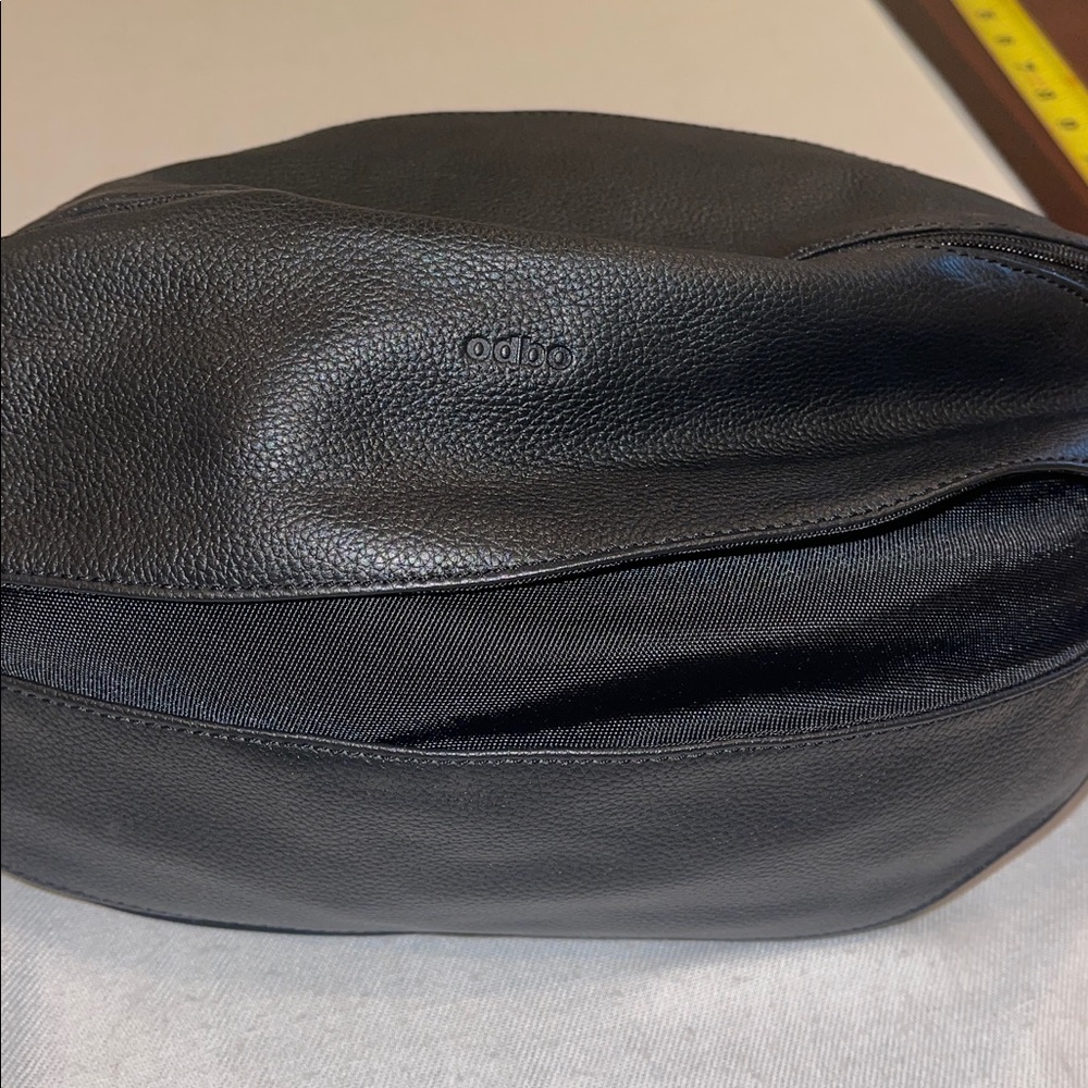 Odbo bag leather shaped like a football. Very unique